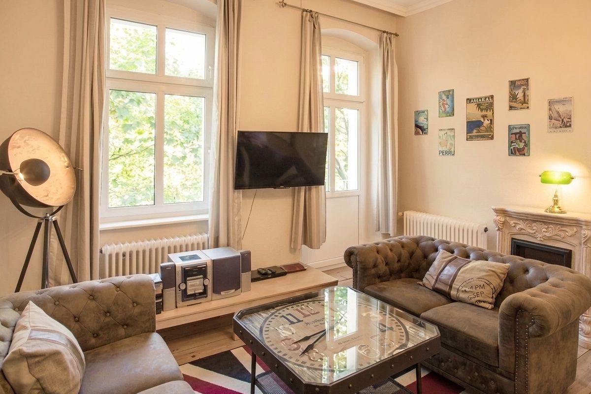 Vacation rental living room with enhanced lighting — after enhancement